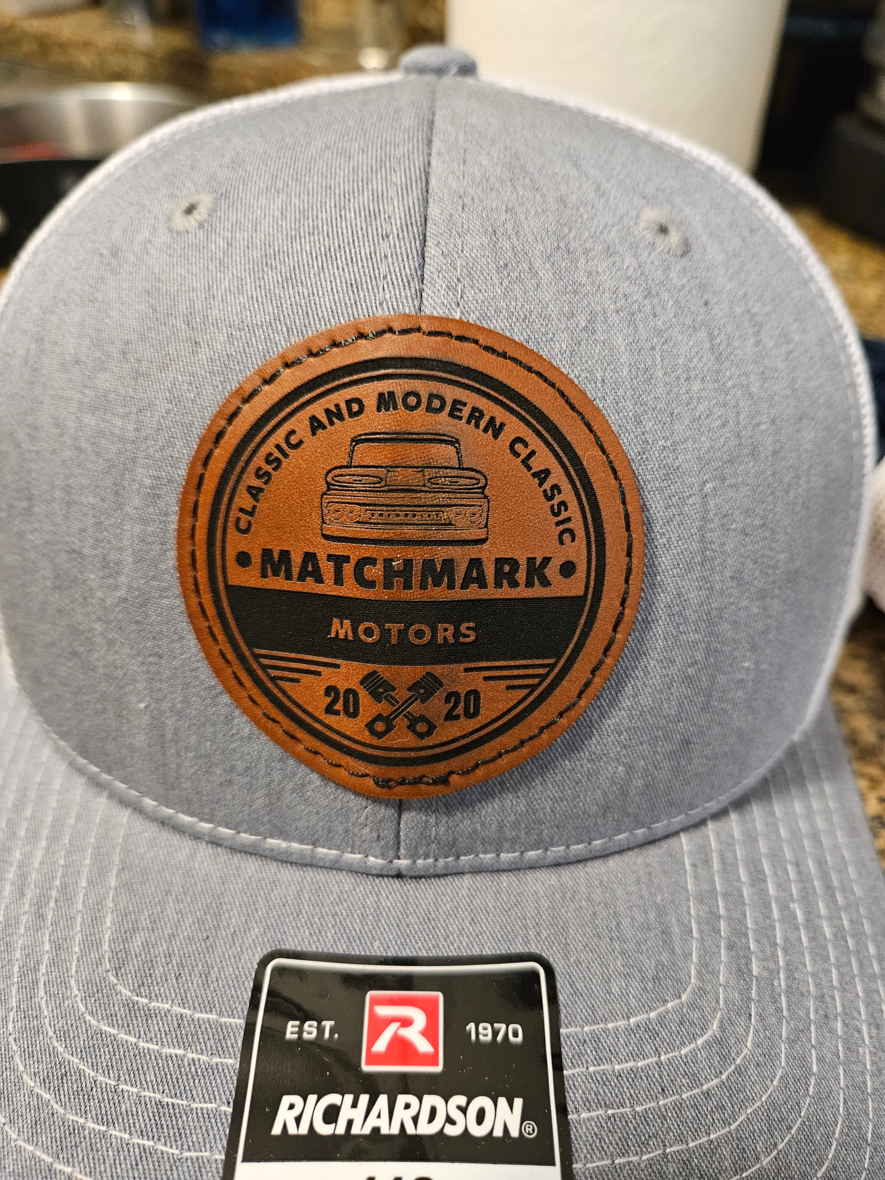 Leather-patch trucker hat